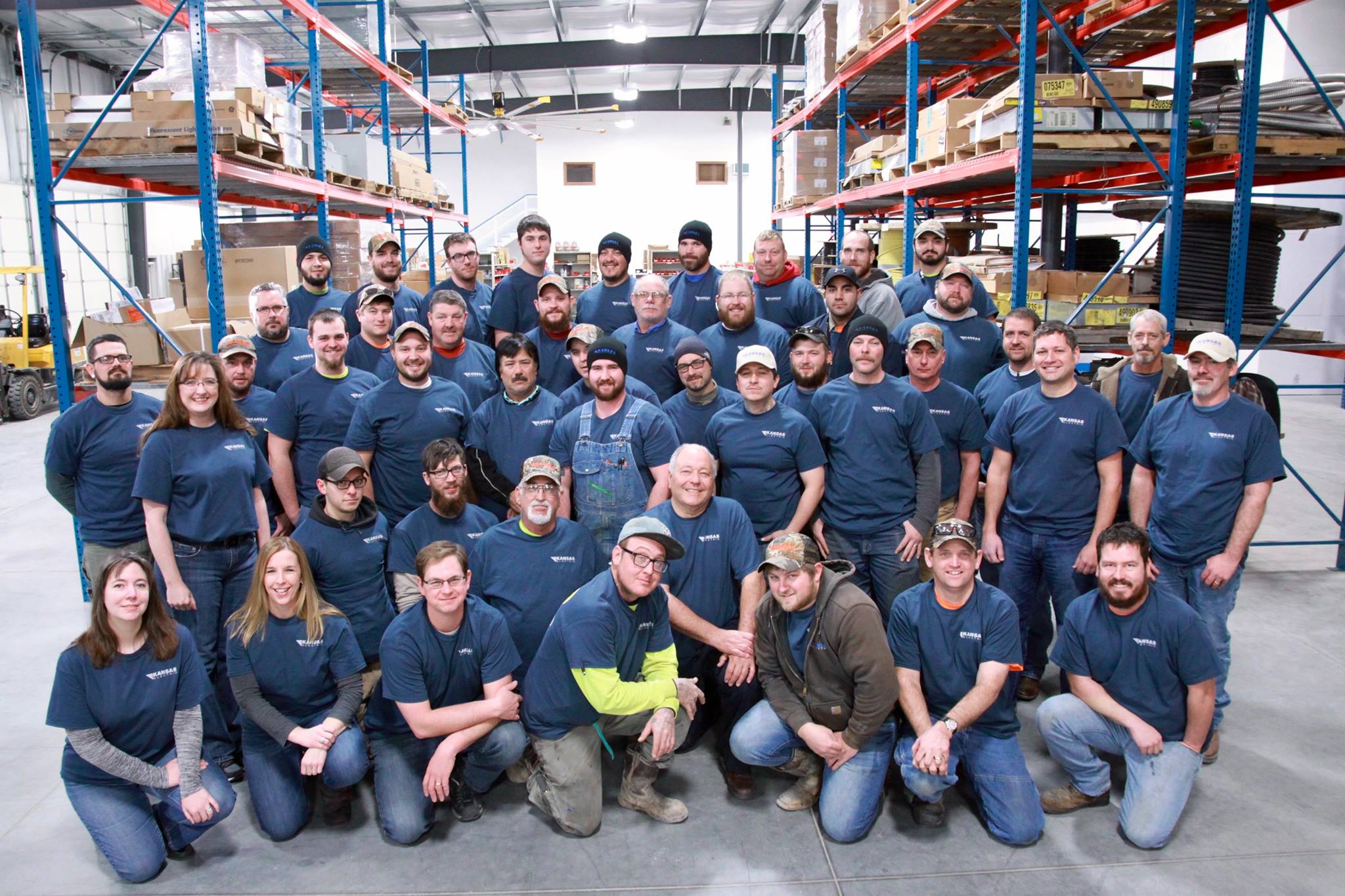 Kansas Electric employees in the warehouse